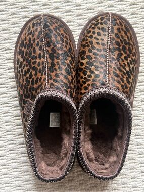 UGG Ladies Animal Print Cozy Slip-Ons in Brown and Black